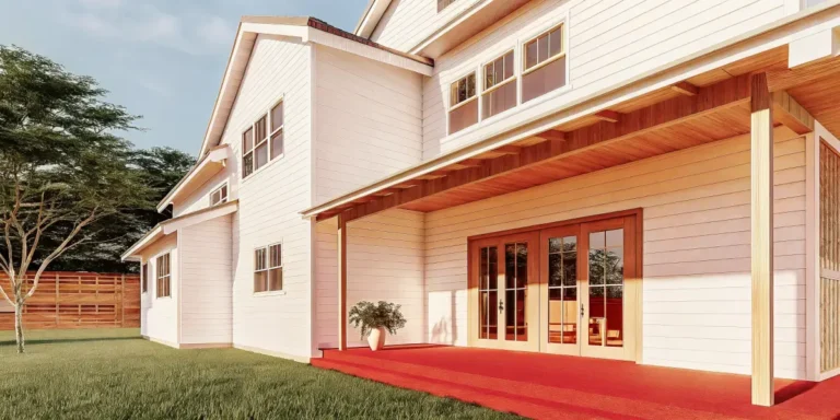 A beautiful suburban home in Denver under bright sunlight showing a freshly painted exterior